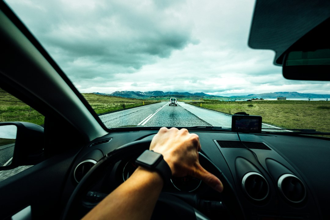 Driver behind the wheel representing car rental with driver in Islamabad