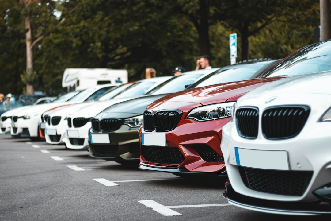 Row of compact and sedan vehicles representing economy car rental choices in Islamabad
